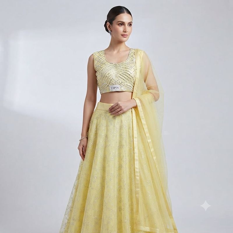 Elegant Sunshine Yellow Embroidered Net Lehenga Choli Set
