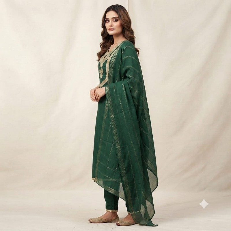 womens dark green embroidered kurta, trouser, and dupatta set.