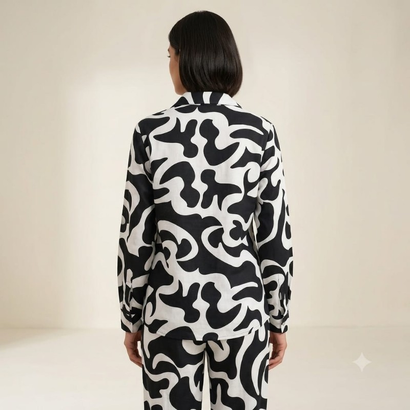 womens black and white abstract print shirt and trouser co-ord set.