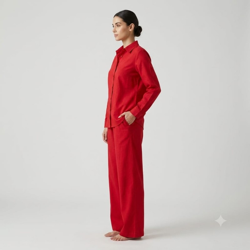 womens red button-down shirt and trouser co-ord set.